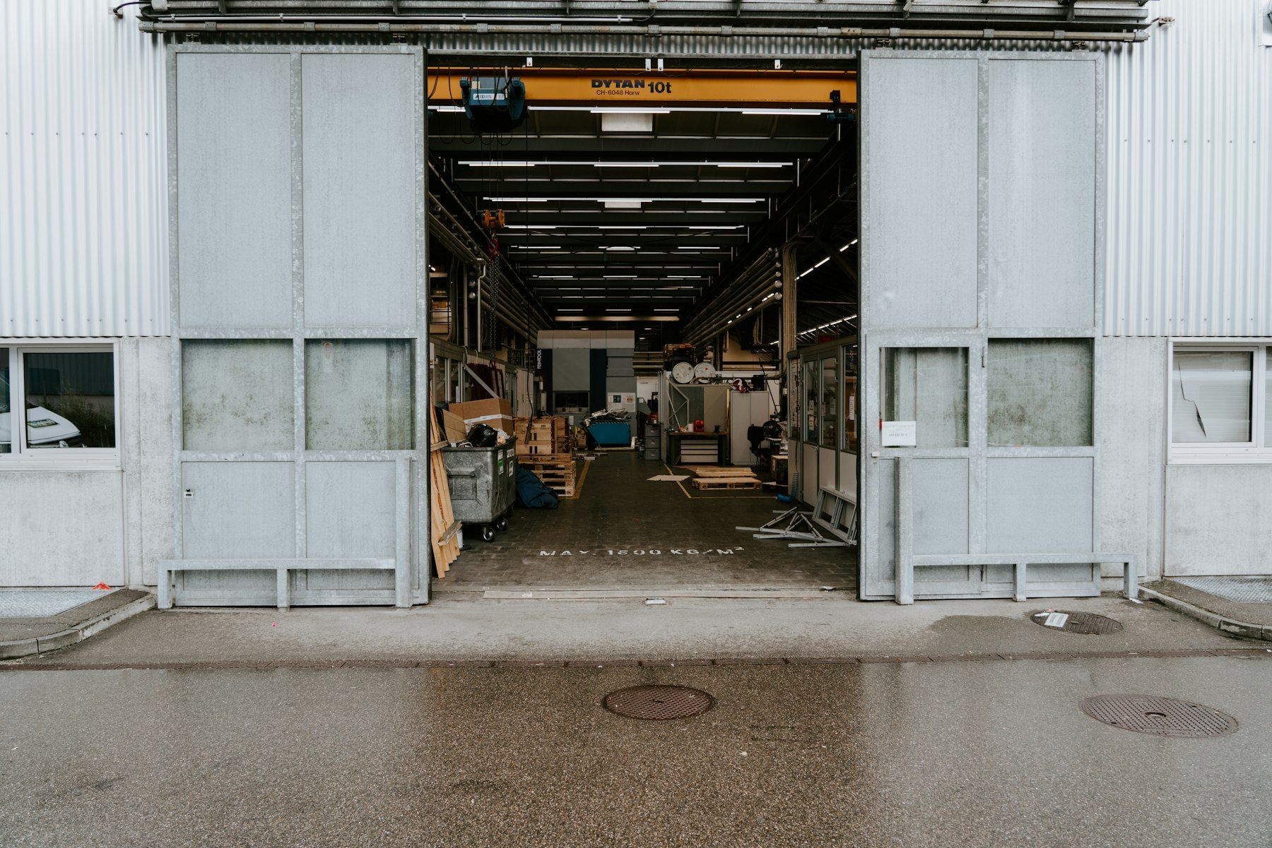 Open stage door into a large clear-span interior
